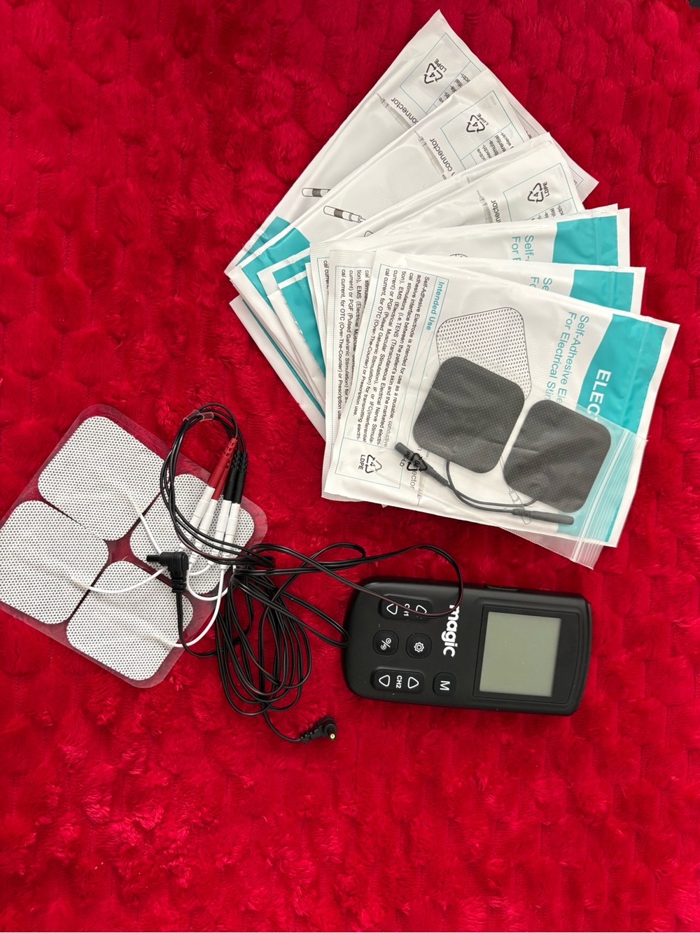 Massage TENS Unit with Electrode Pads - Black and compression calf pads